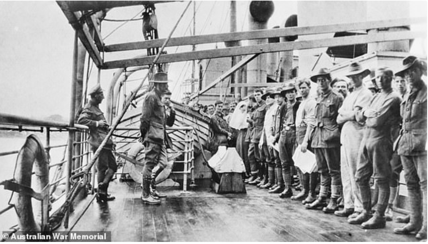 Australian troops line up on troop ship for a 'thermometer parade'