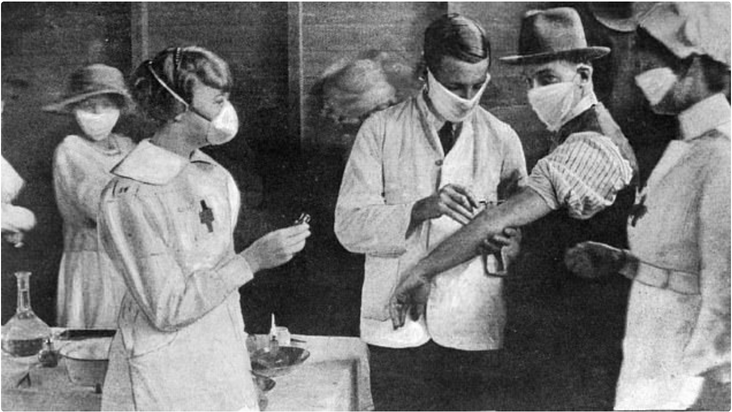 Doctor and nurse inoculating Sydneysiders at a Spanish flu response clinic