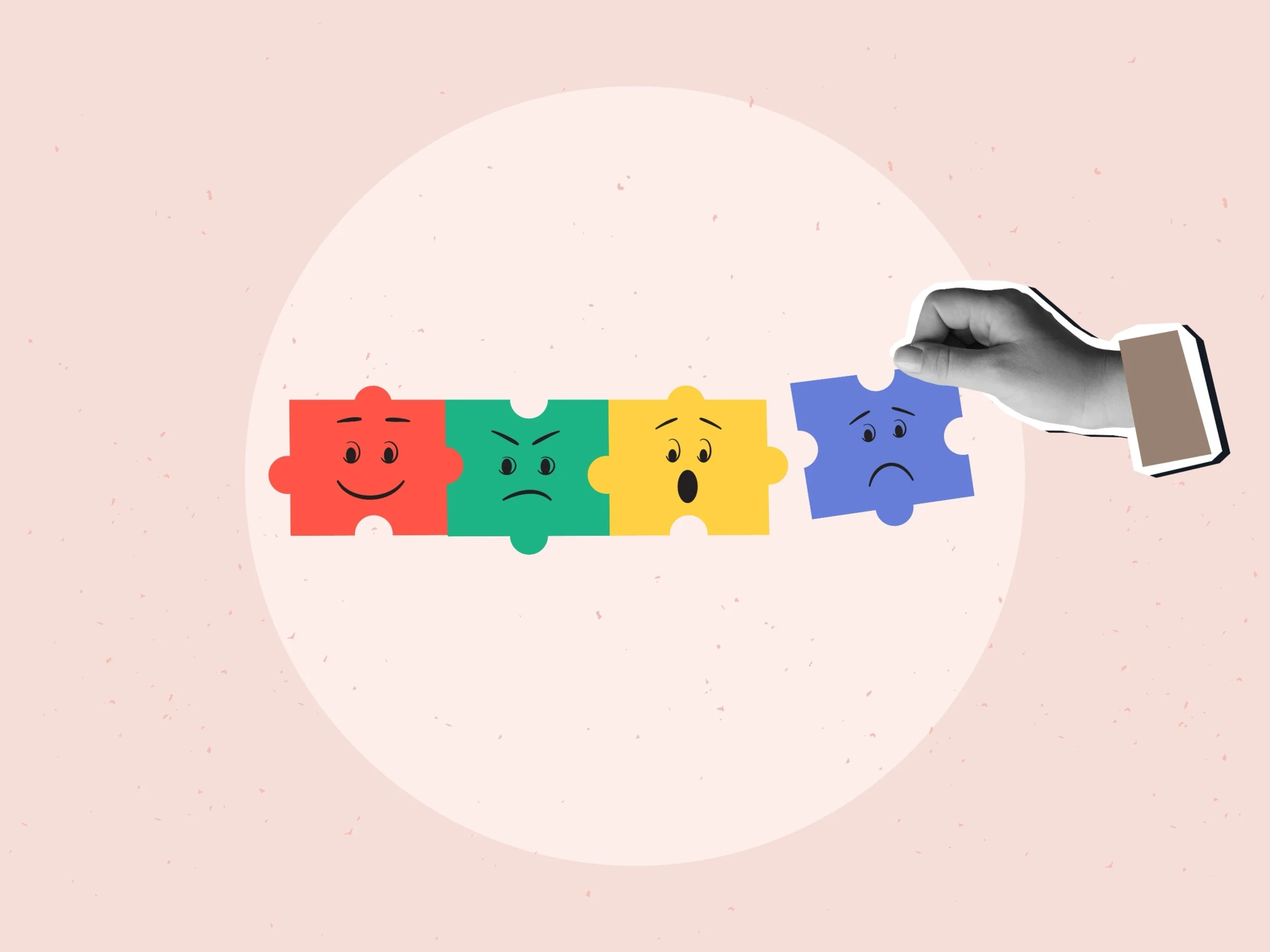 Cztery kolorowe puzzlepieces z narysowanymi minami — radosną, gniewną, zaskoczoną i smutną — składane przez dłoń w garniturze. Ilustracja symbolizująca budowanie inteligencji emocjonalnej.