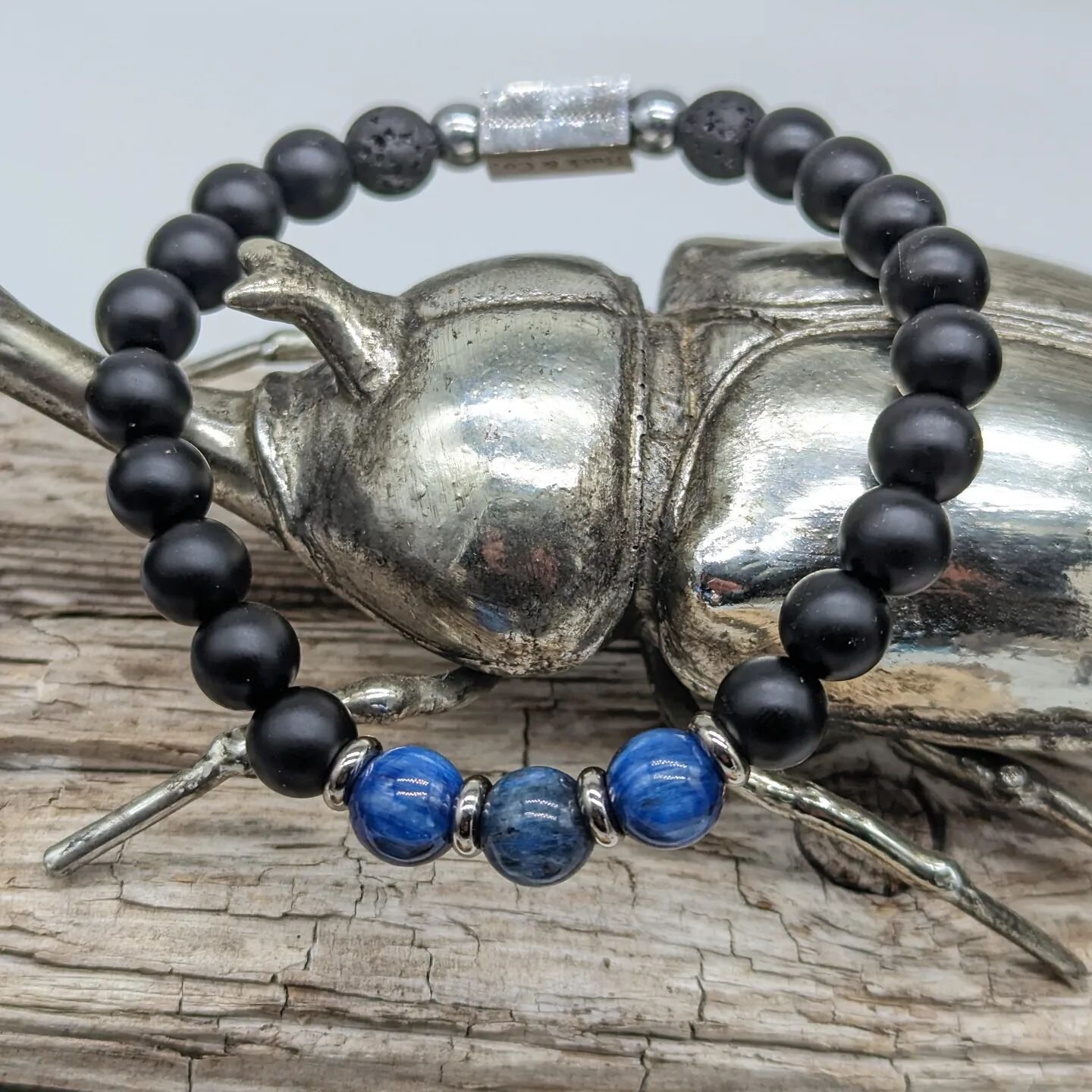 Calling all cars
This black onyx, basalt and kyanite Huck &amp; Co. Intention bracelet is great for encouraging  self-examination, self-awareness and promoting logical thinking. Great for lower back. Promotes vigor, steadfastness and stamina.  Impart