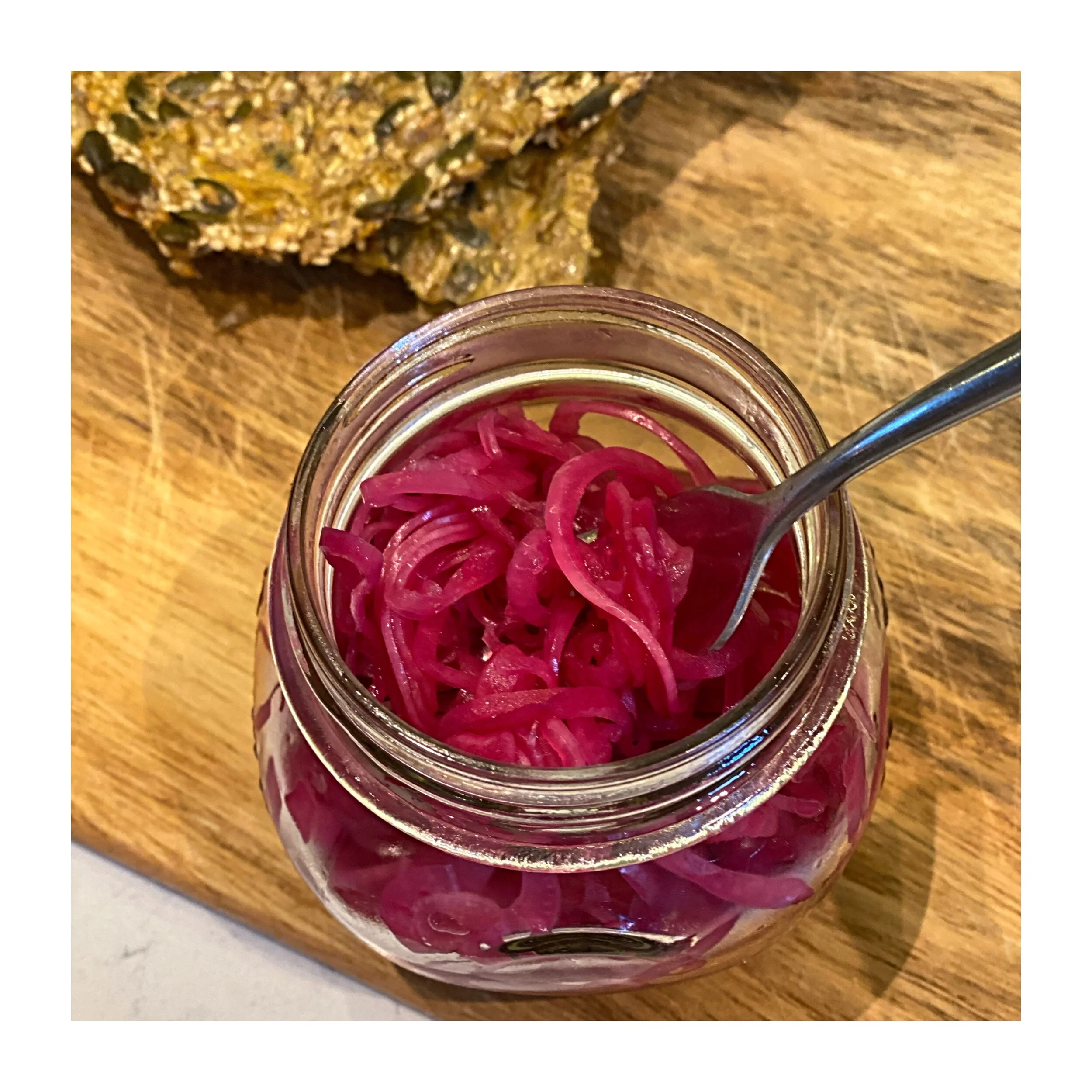 Red pickled onion with lime and bay
