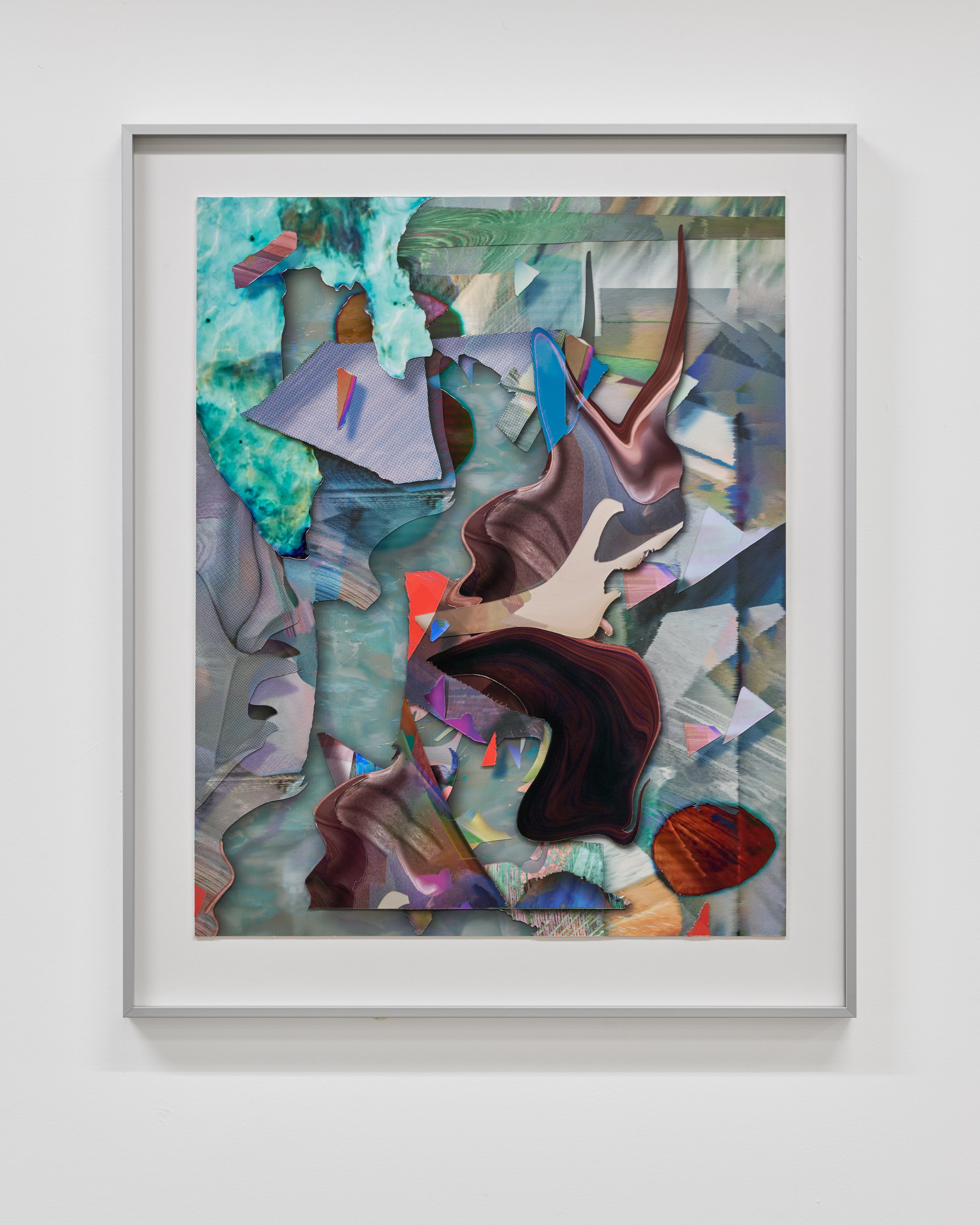 An abstract mixed-media artwork with colorful, textured paper and paint layered and torn, framed and mounted on a white wall.