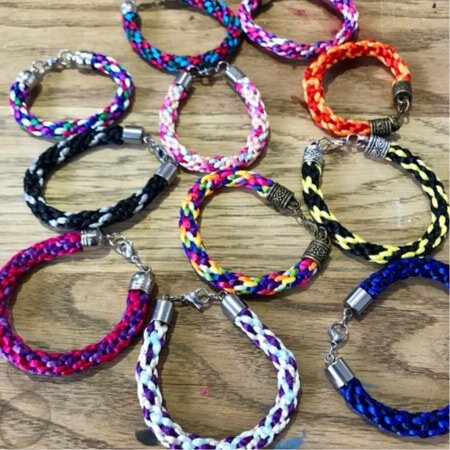 Kids learn Kumihimo Braided Jewellery in our craft workshops in Cardiff, Cathays! (Copy)