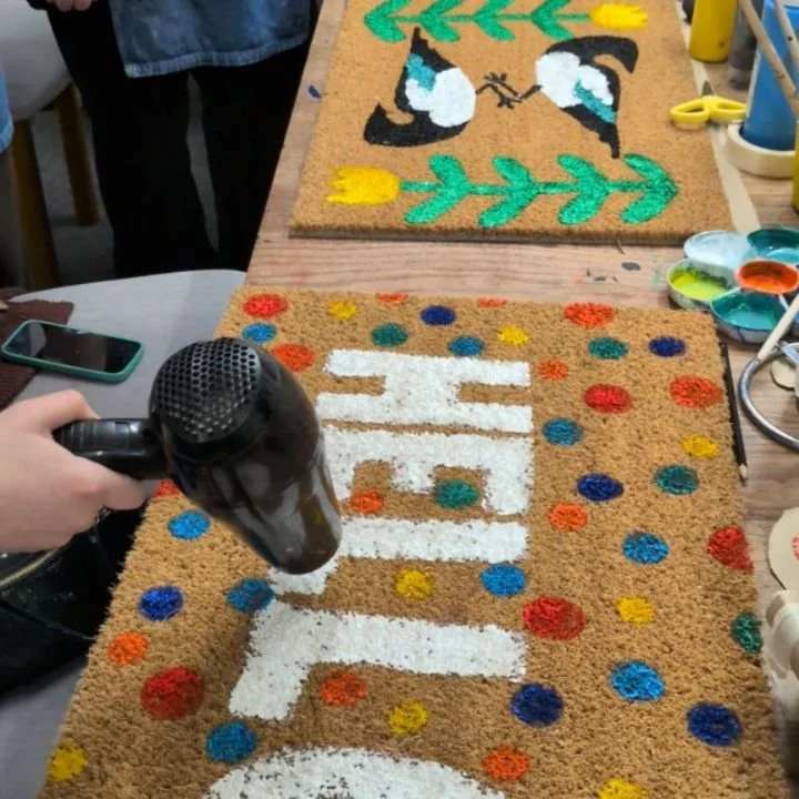 Doormat painting - such a great social, there were such good chats as everyone made fab new mats for their homes 🏠 

I love the two magpies representing 'two for joy' &amp; and the Welsh dragon cookie cutter that was brought in to be used a stencil 