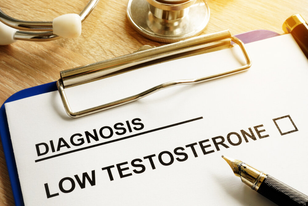 Diagnosis Low testosterone and pen on a desk