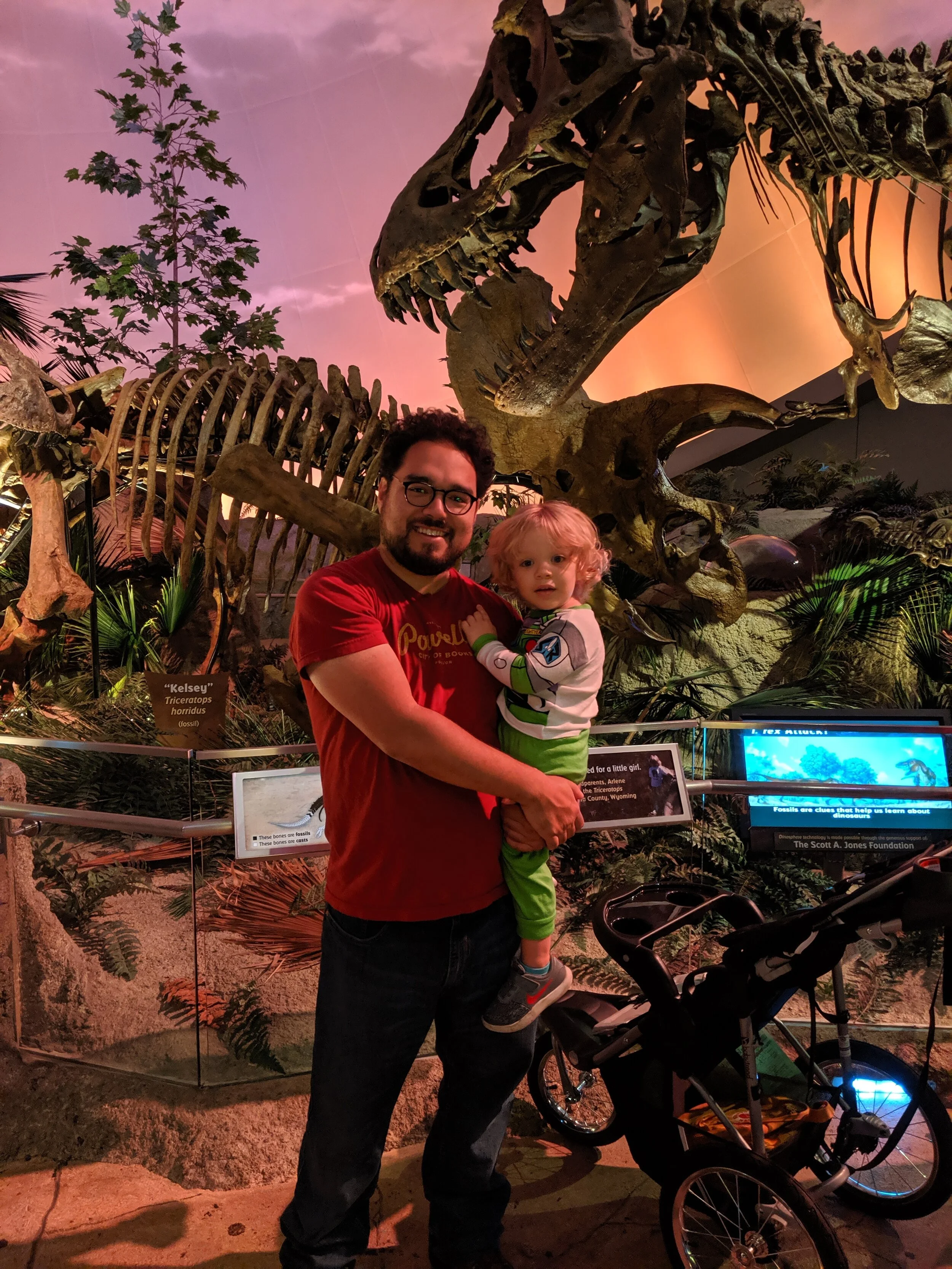 Ries and Gus at the Children’s Museum in Indianapolis. Gus thinks he is simultaneous Buzz Lightyear and a T-Rex.