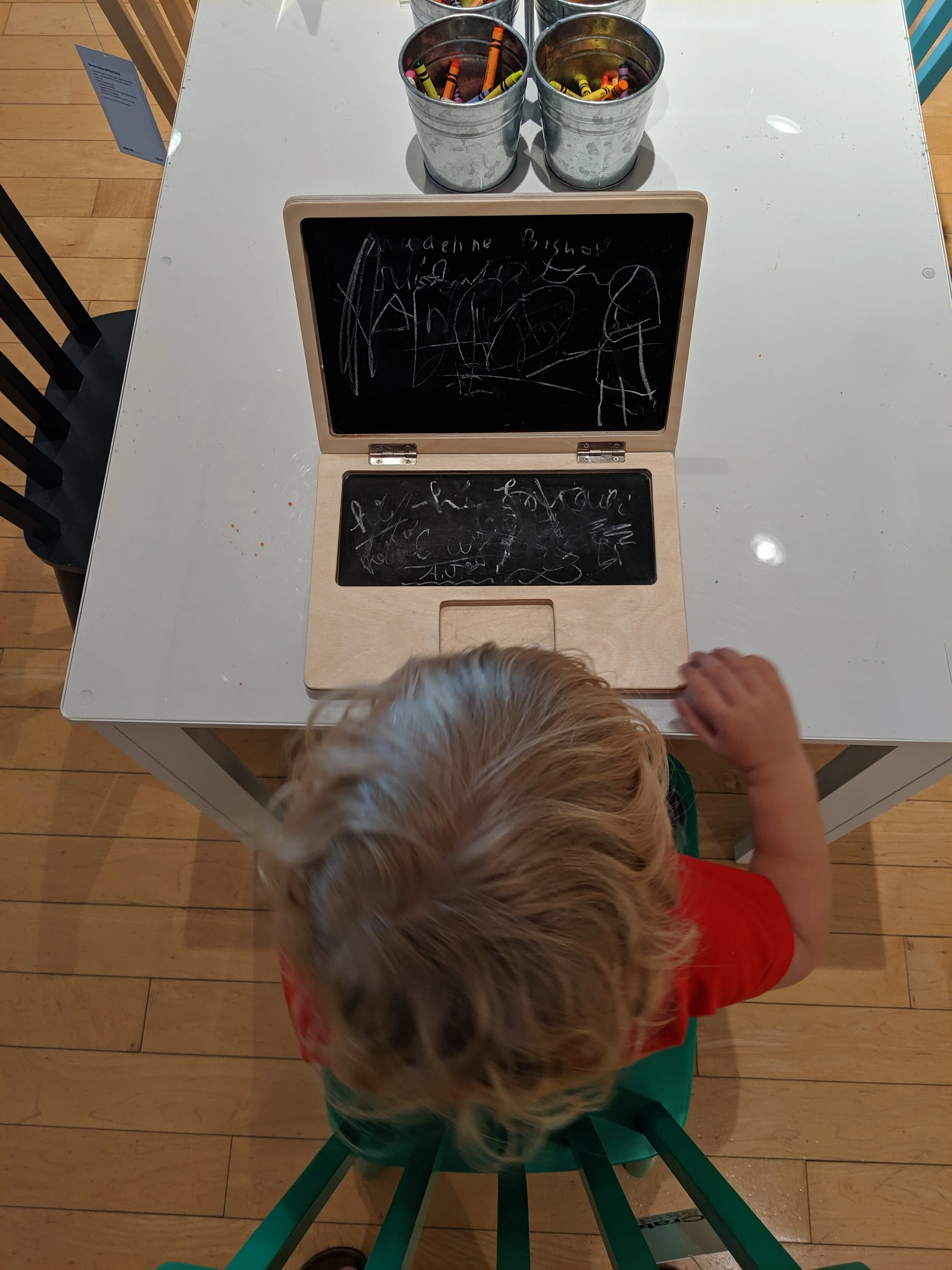 Gus “working” on a toy laptop at Crate and Barrel.