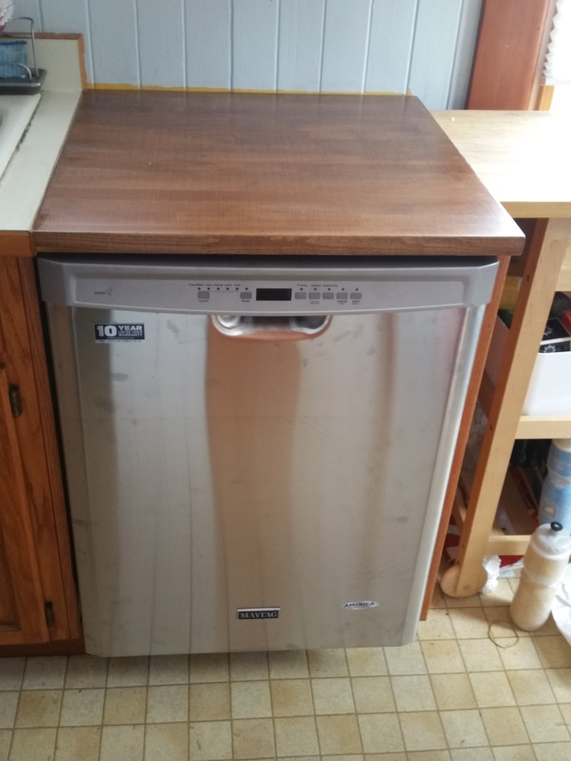  New dishwasher & counter top makes for happy renters and satisfied property managers.
 