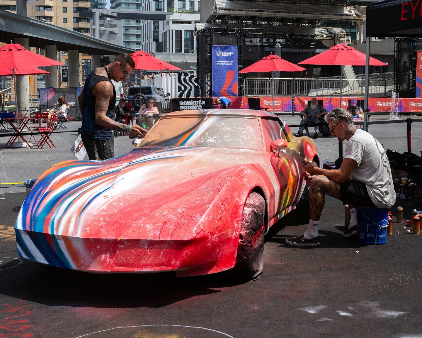 ON NOW: 🎨✨ @carrera Paint My Ride Tour Stops in Toronto for their 70th Anniversary! ✨🎨⁠
⁠
Experience the magic at Sankofa Square until 6 PM! Watch two incredible local artists, @brunosmoky and @thehalfdecent, battle in a live art competition, trans