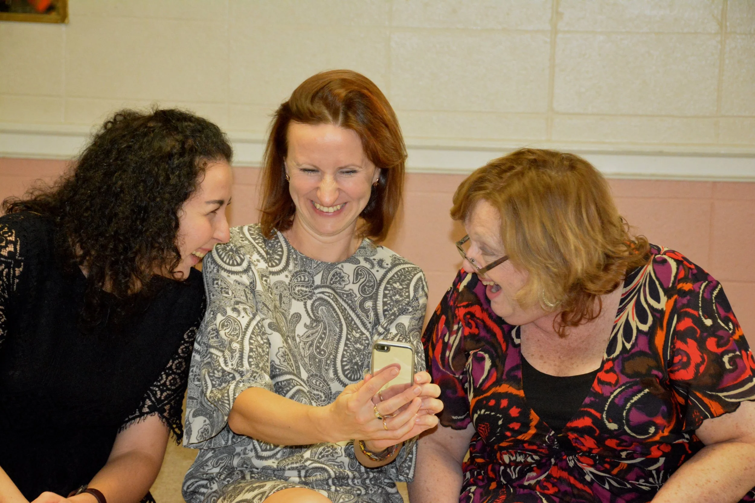 Students laughing with teacher.jpg