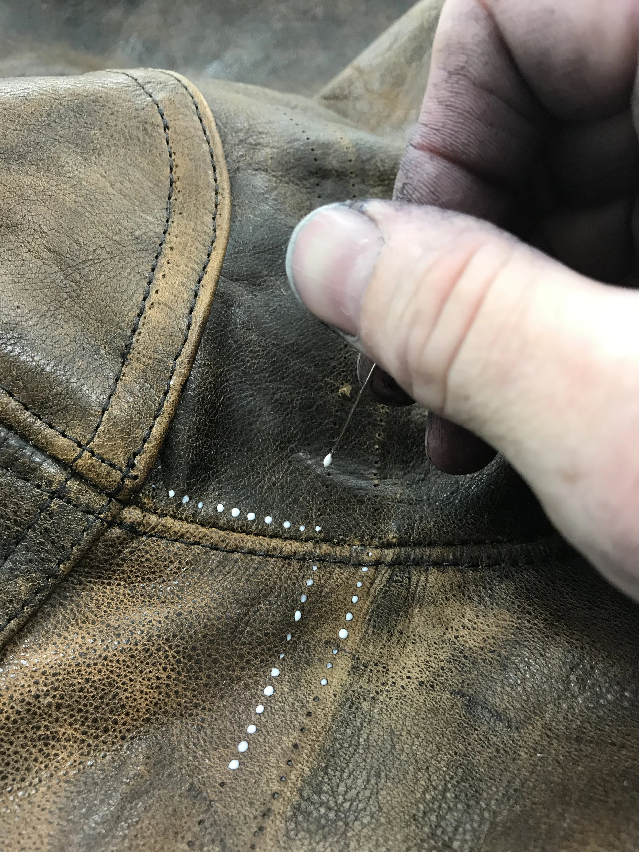 Eddie Brock's leather jacket alteration. in process to fix and eliminate the stitch holes. Venom 2018