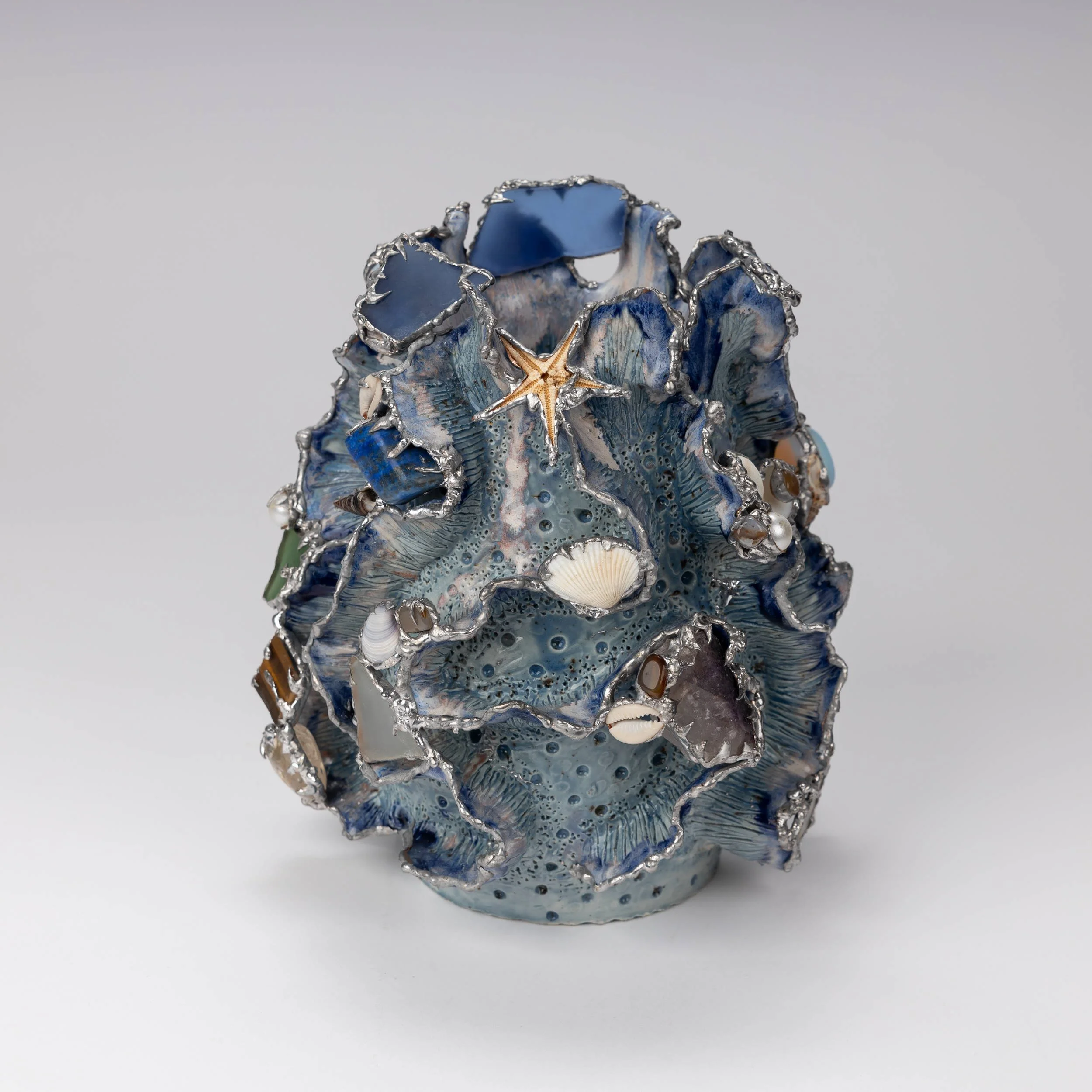  Betty Greiser   Caught in the Current -Blue    Porcelain mixed media   24cm ht 