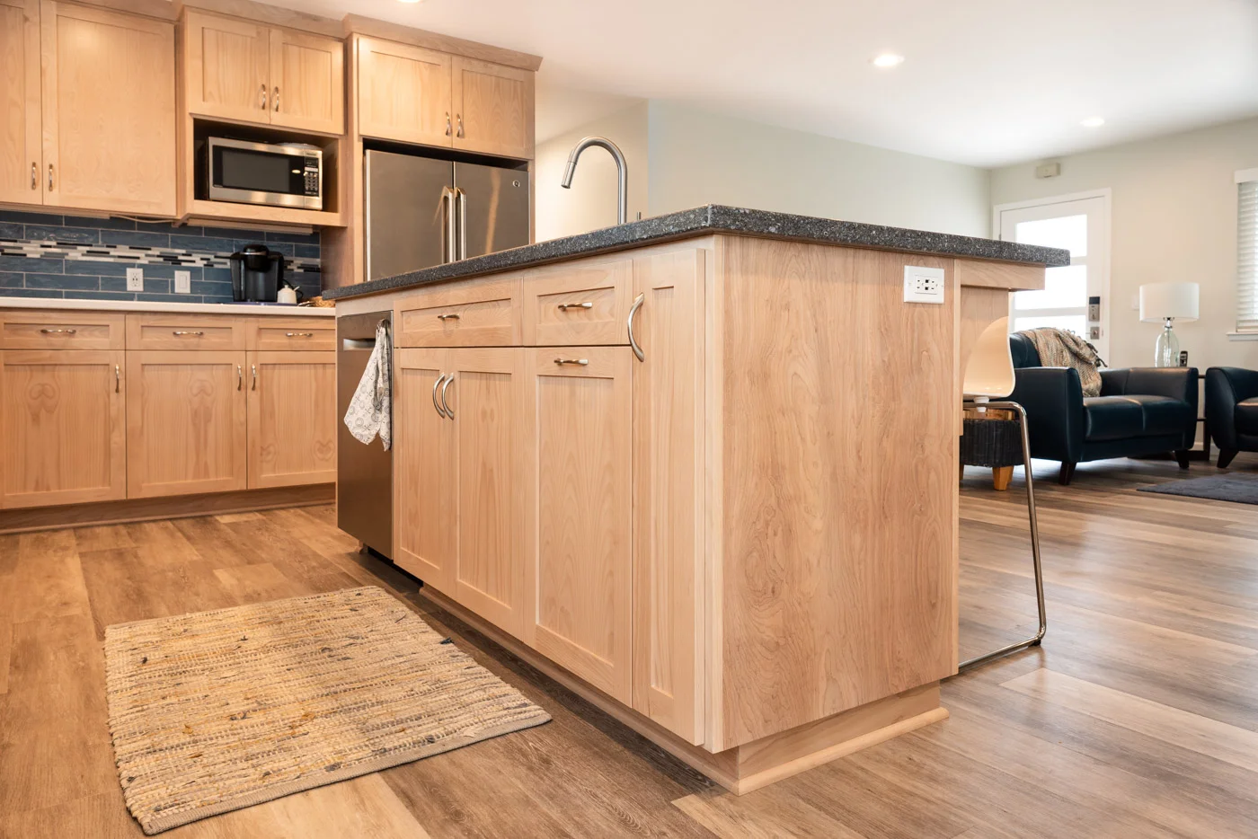 Coastal Contemporary custom kitchen cabinets with natural wood stain and custom island