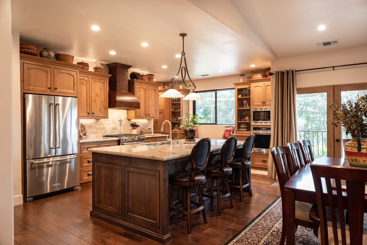 Tuscan Artisan custom stained Alder wood kitchen cabinets