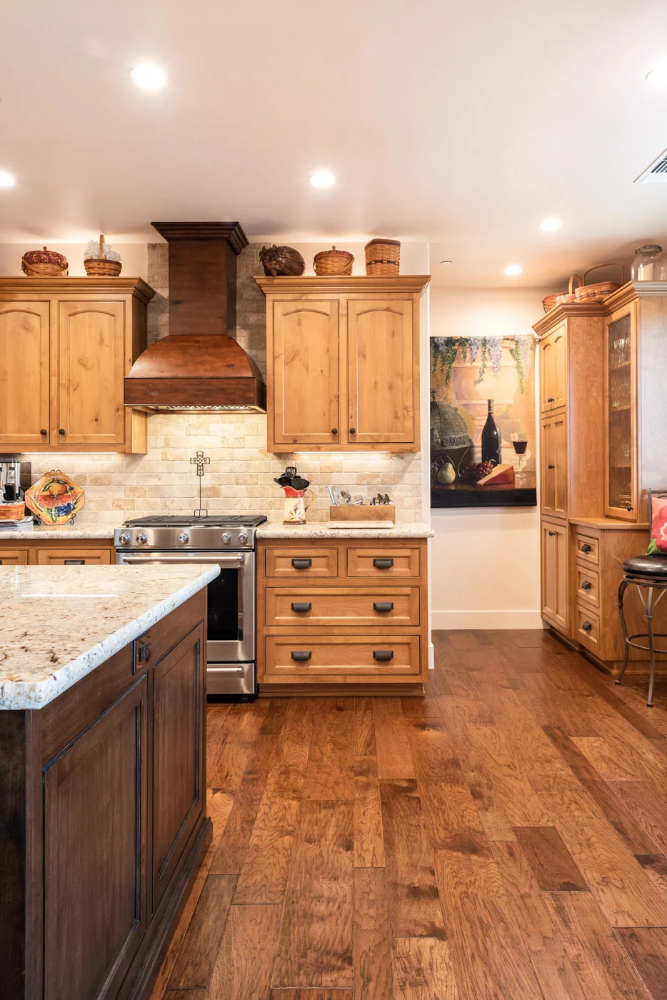 Tuscan Artisan custom stained Alder wood kitchen cabinets