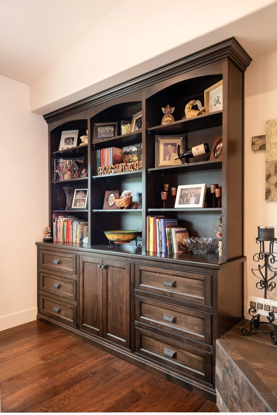 Tuscan Artisan custom stained Alder wood living room built-in bookcase cabinet