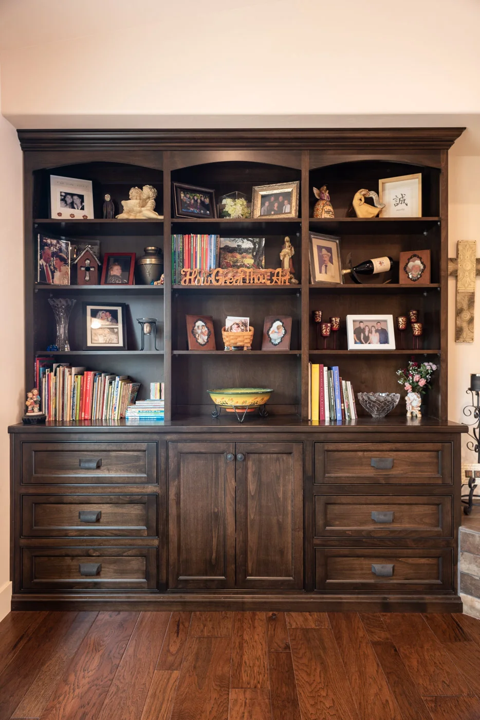 Tuscan Artisan custom stained Alder wood living room built-in bookcase cabinet