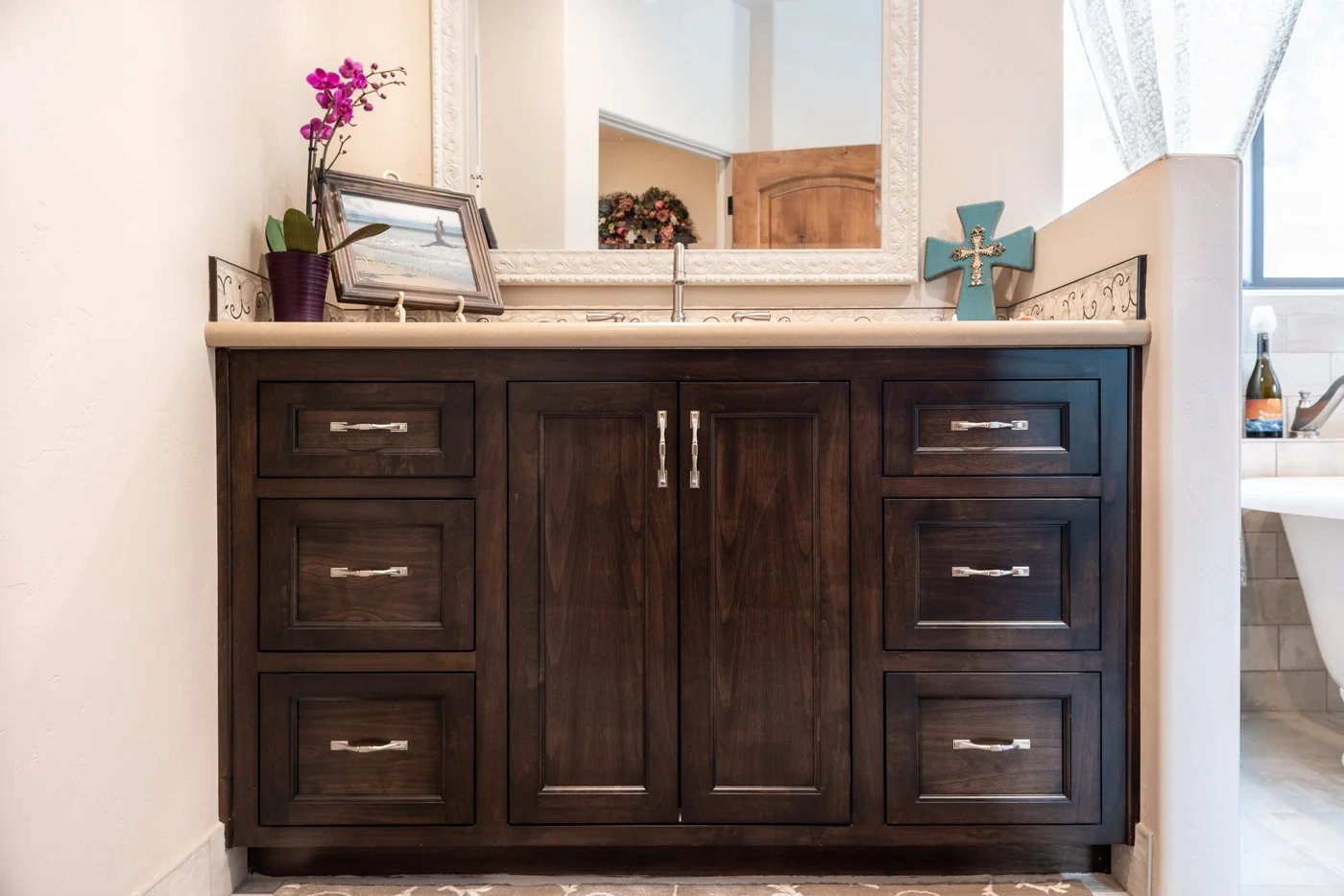 Tuscan Artisan custom stained Alder wood bathroom vanity cabinet