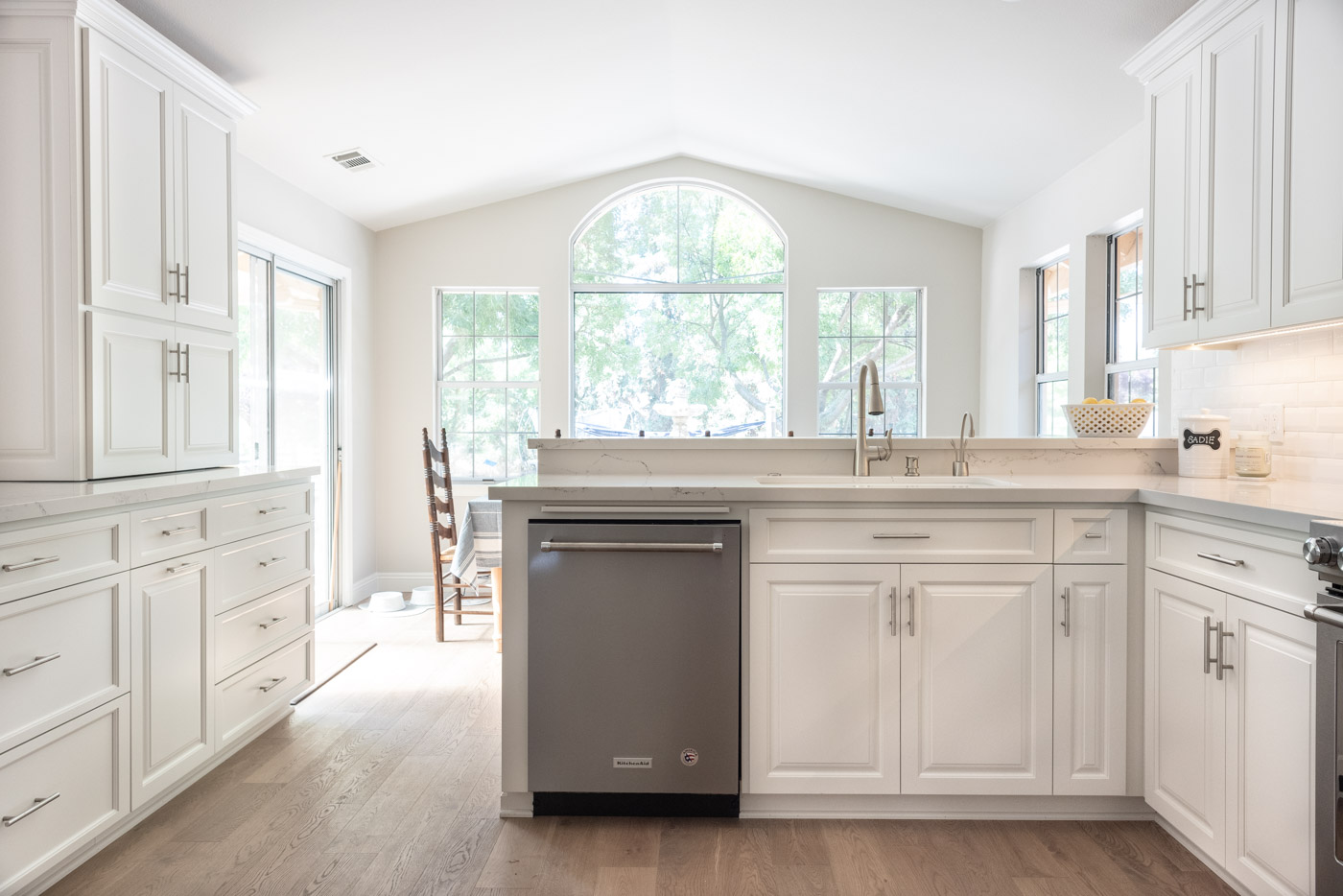 Modern Farmhouse Cottage kitchen with custom white painted cabinets