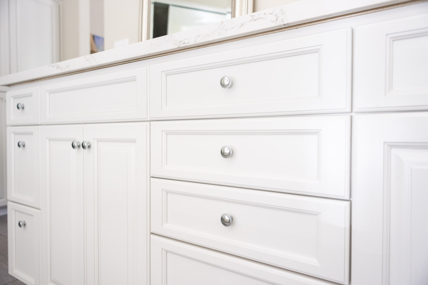 Modern Farmhouse Cottage bathroom vanity with custom white painted cabinets