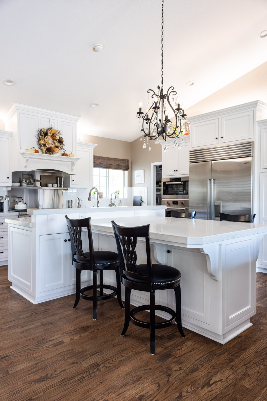 Transitional Country Cottage style kitchen with white recessed panel painted cabinets