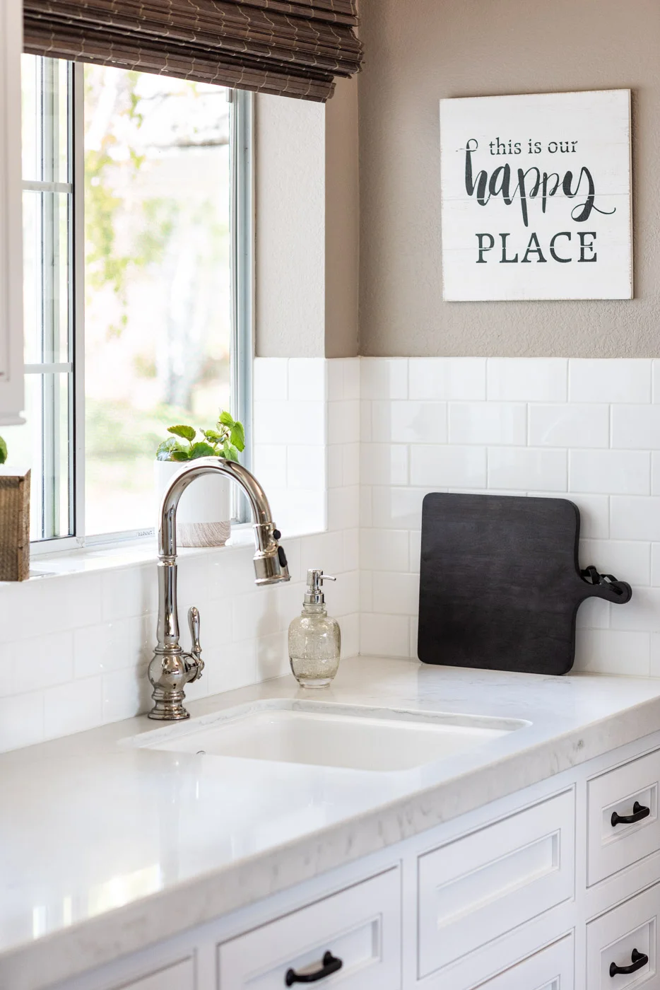 Transitional Country Cottage style kitchen with engineered quartz marble style counter tops