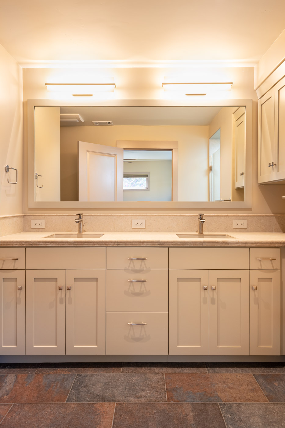 Craftsman bathroom vanity with custom painted shaker style cabinets