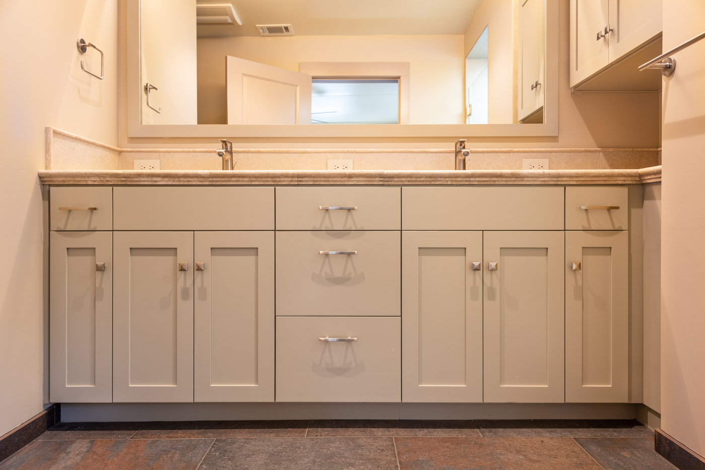 Craftsman bathroom vanity with custom painted shaker style cabinets