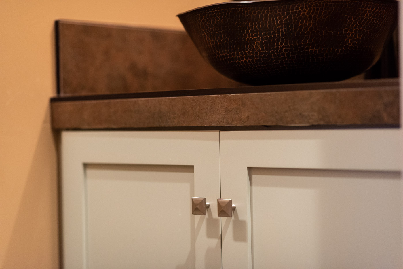 Craftsman bathroom vanity with custom painted shaker style cabinets