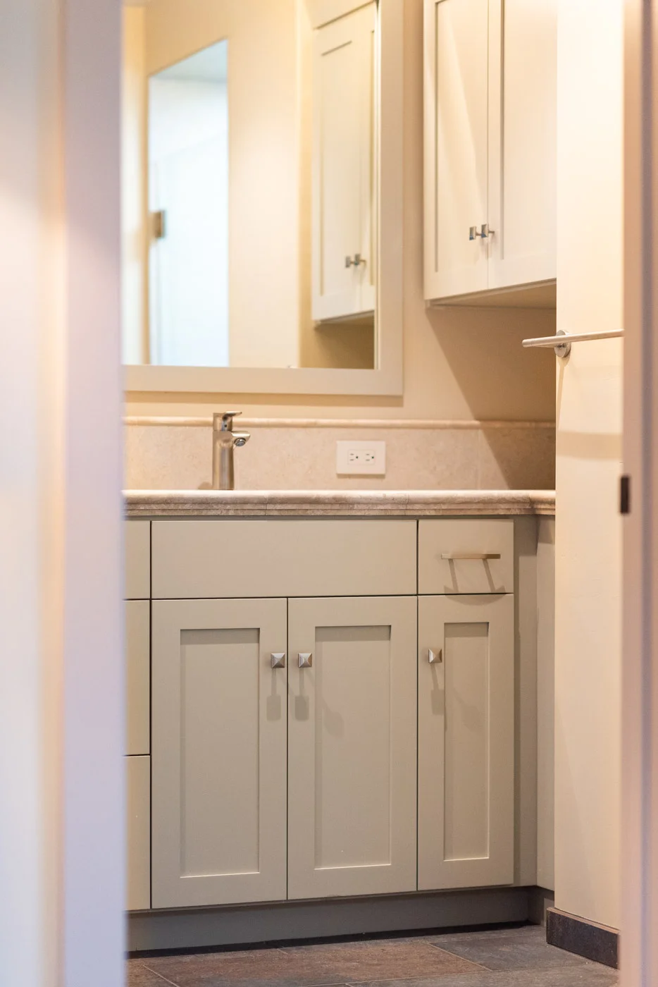 Craftsman bathroom vanity with custom painted shaker style cabinets