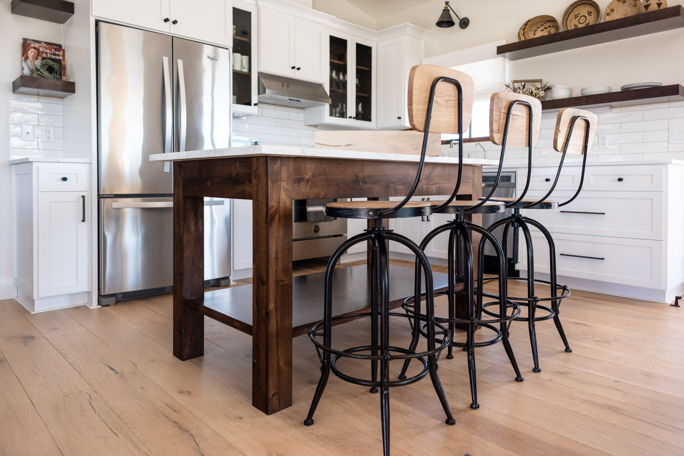 Vineyard Guest House kitchen with custom white painted shaker cabinets and free standing wood island