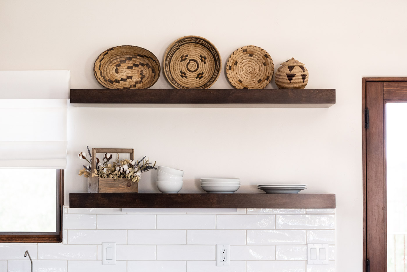 Vineyard Guest House kitchen with custom white painted shaker cabinets and open shelving