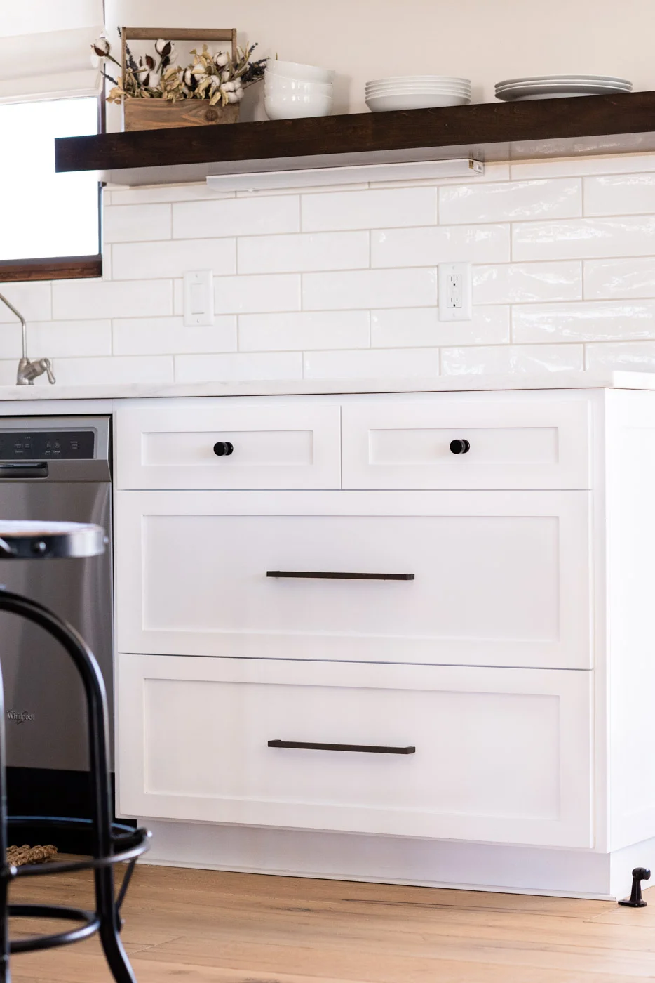 Vineyard Guest House kitchen with custom white painted shaker cabinets and open shelving