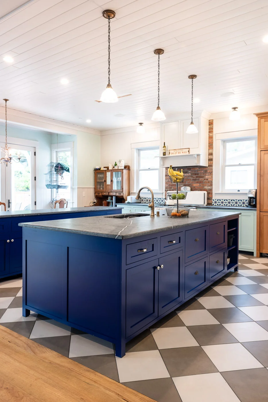 Eclectic Country Craftsman kitchen with custom blue painted cabinets and two islands