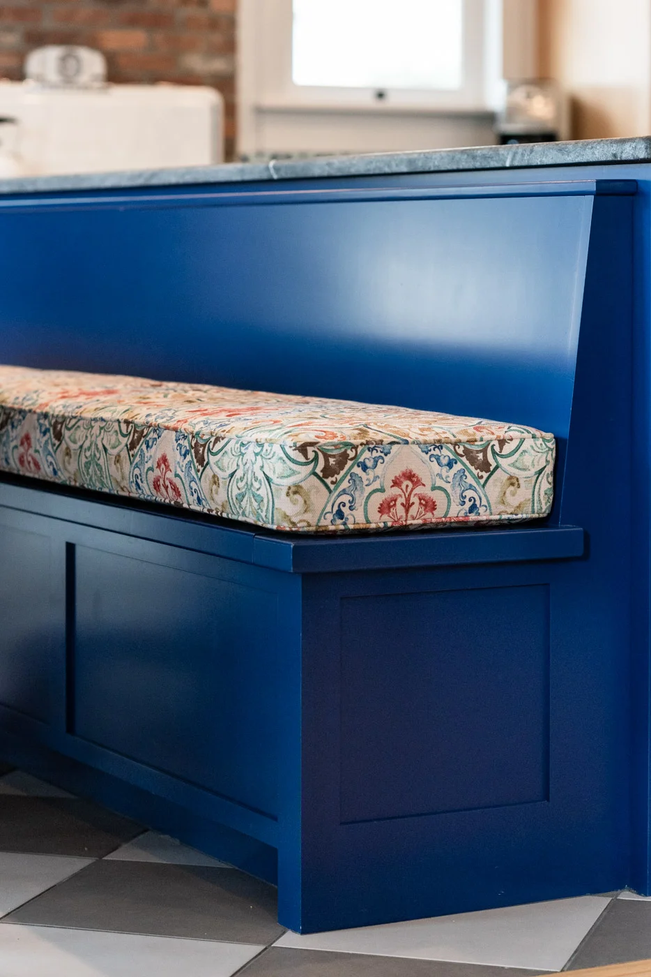 Eclectic Country Craftsman kitchen with custom blue painted cabinets and built in bench seating
