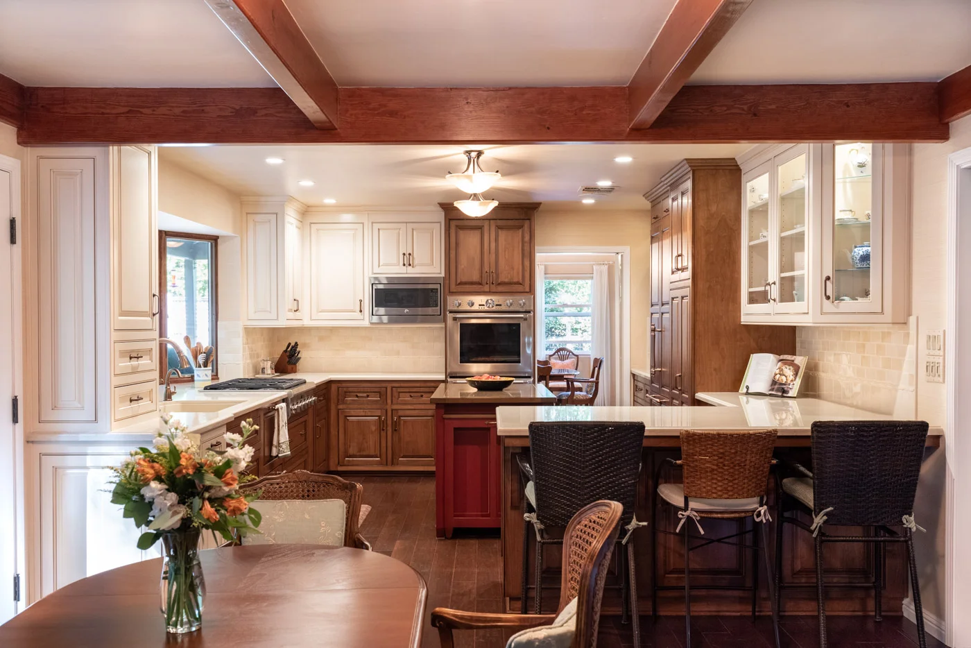 English Country kitchen with mixed finish custom cabinets