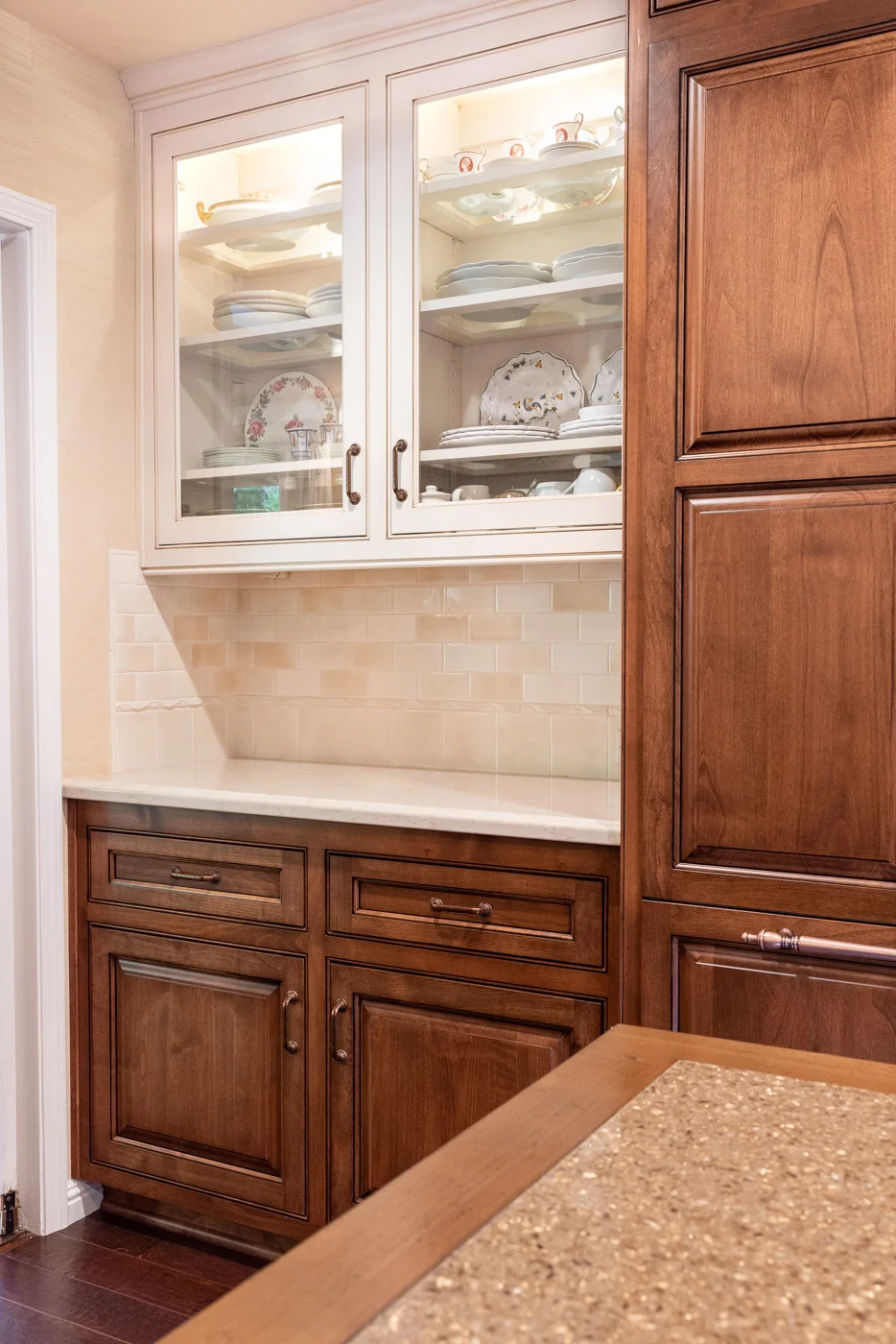 English Country custom kitchen cabinets with glass display cabinets