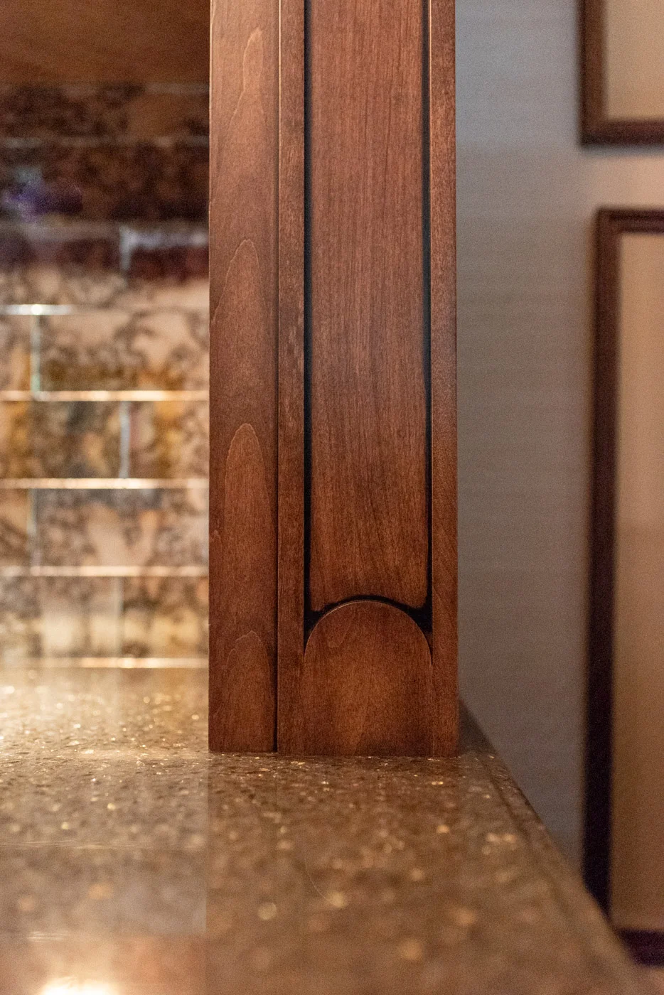 English Country custom home bar with quartz countertop