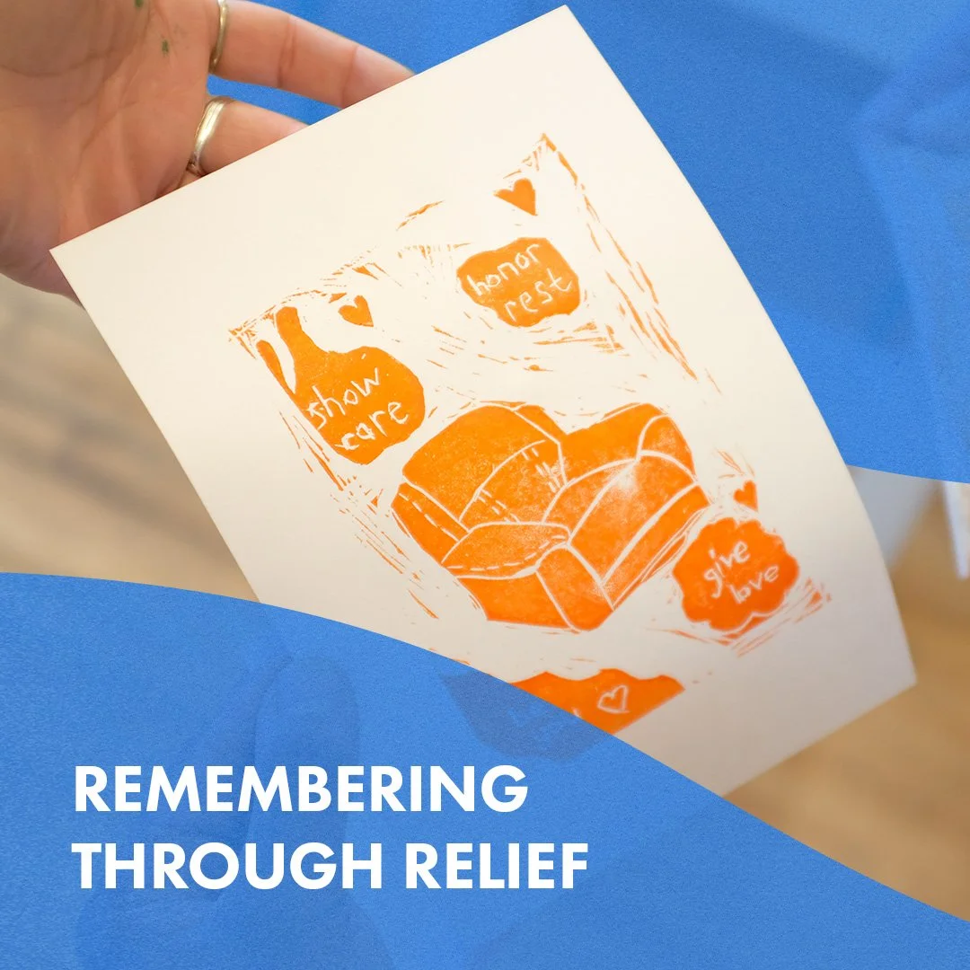 Handing holding a print in orange ink depicting a chair and bubbles with text reading sayings such as 'show care'. Blue shapes at top and bottom with white text at bottom with class title