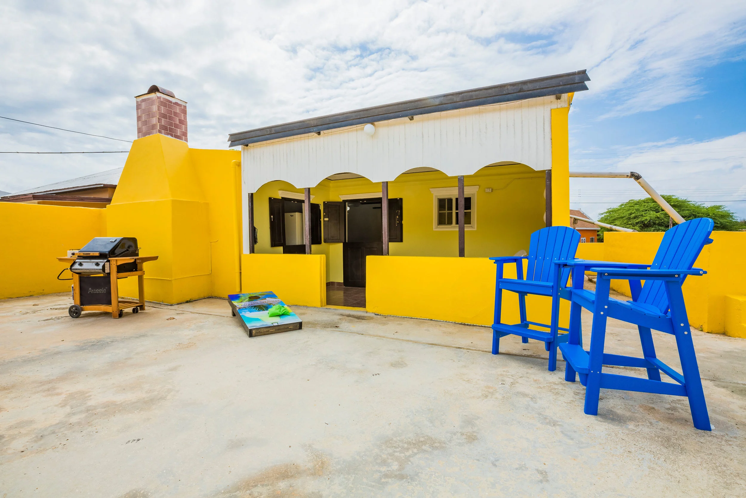 Furnished back patio with BBQ grill