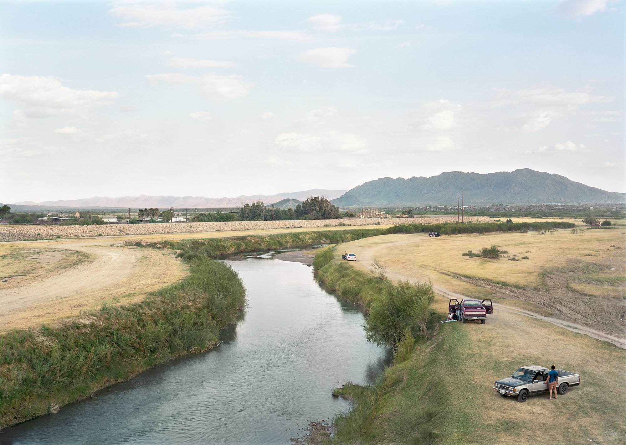 Cars along the Rio Grande, US-Mexico Border, Ojinaga, Mexico, 2019
