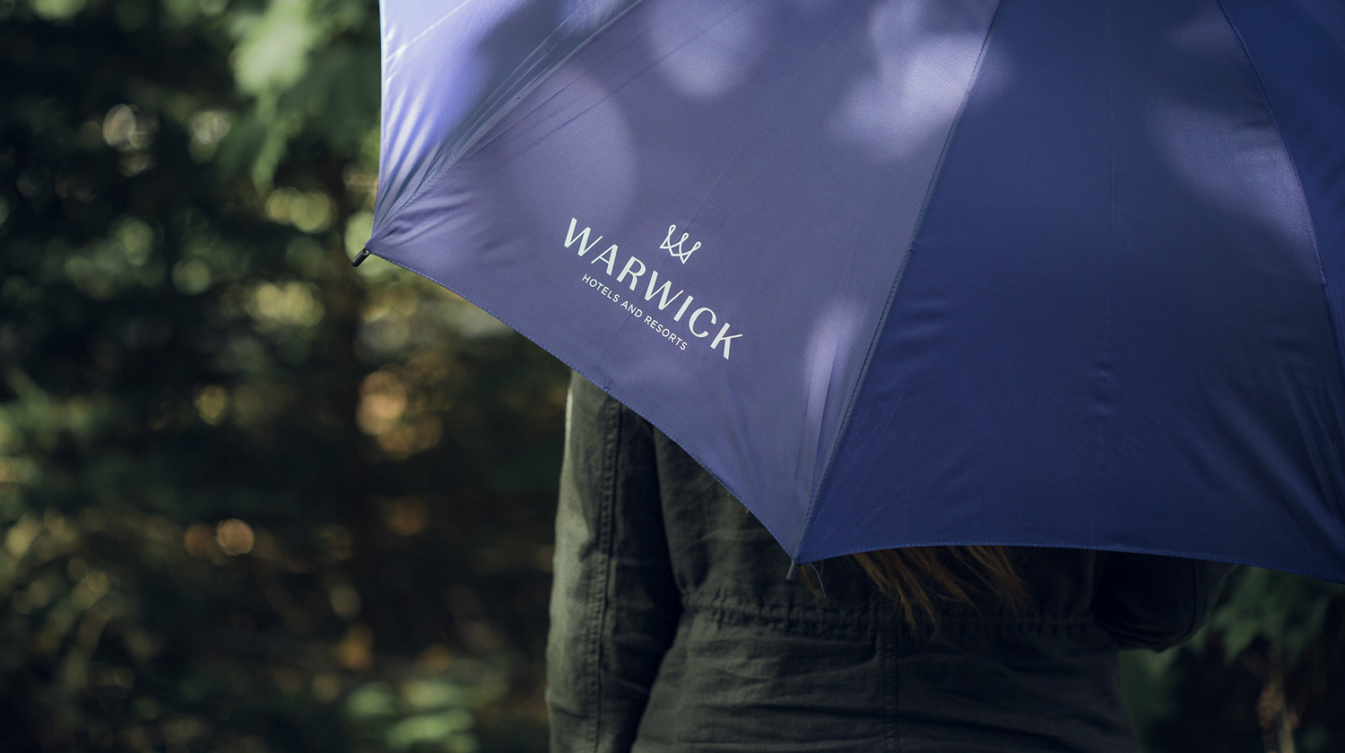 Warwick Hotels umbrella touchpoint design 