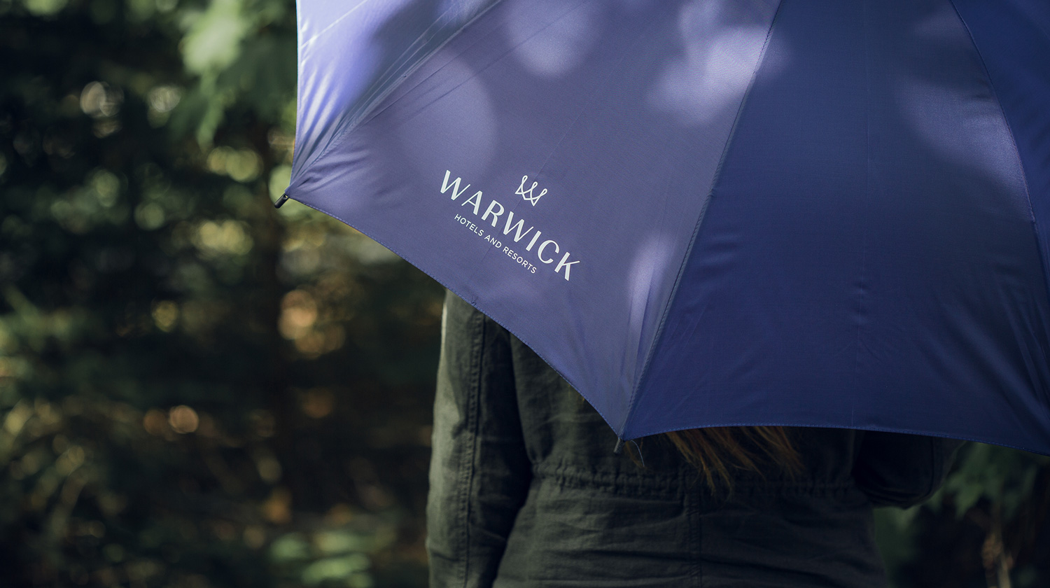 Warwick Hotels umbrella touchpoint design