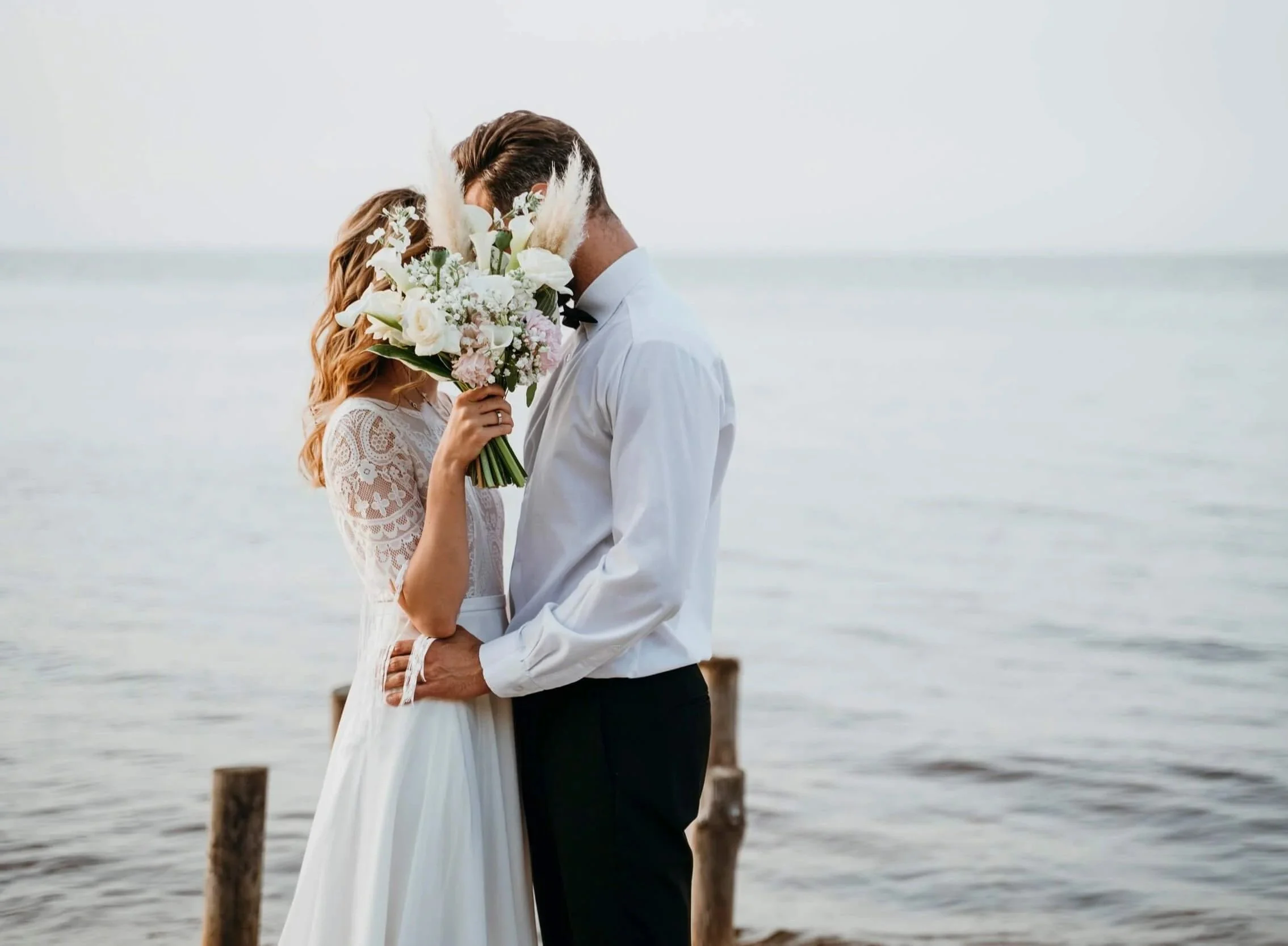 beautiful-couple-having-their-wedding-beach.jpg