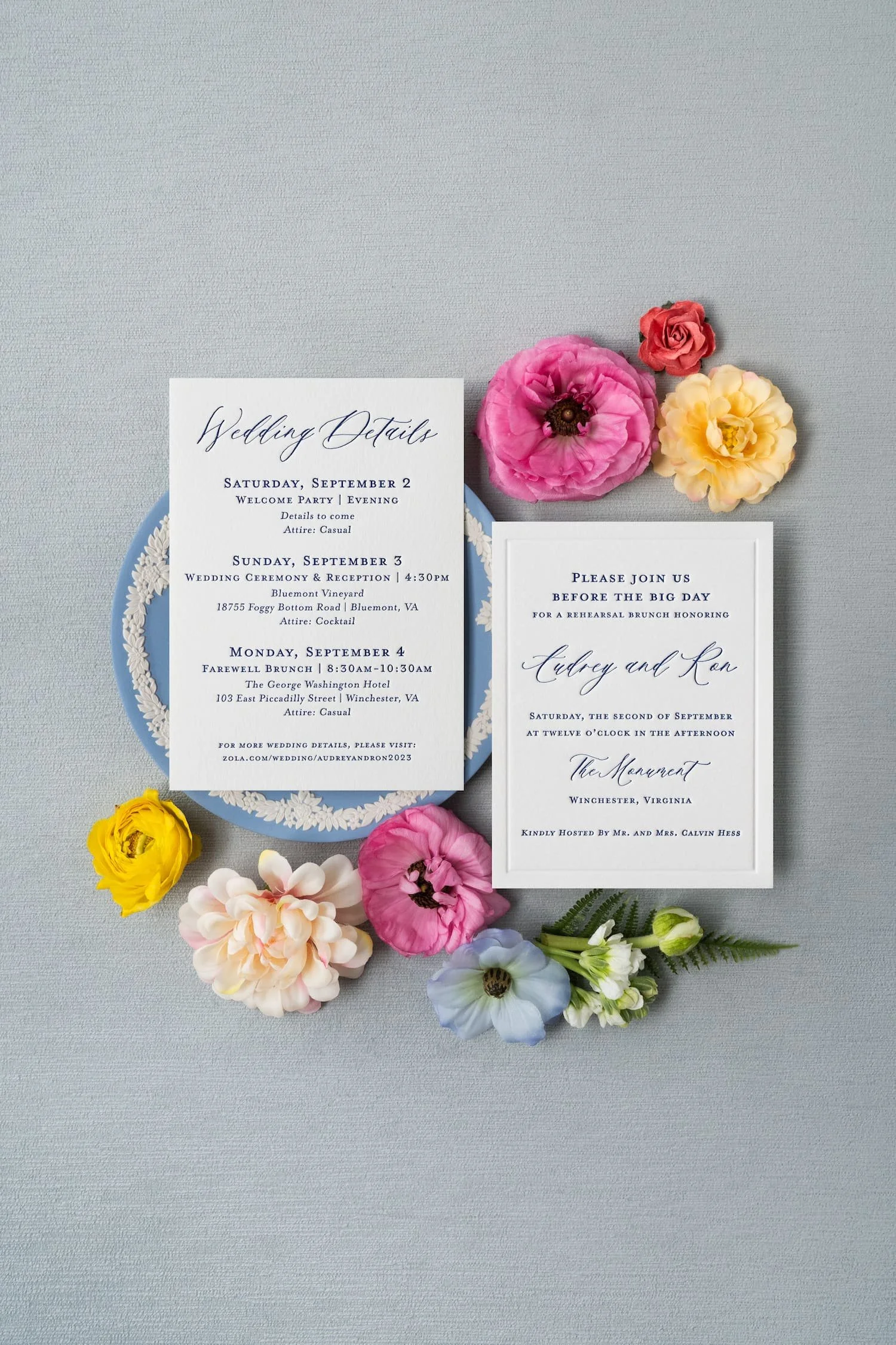 Comprehensive luxury wedding paper story showcasing engagement party invitations, save the dates, wedding invitations, and day-of details with letterpress, blind debossing, edge painting, and custom crest design.
