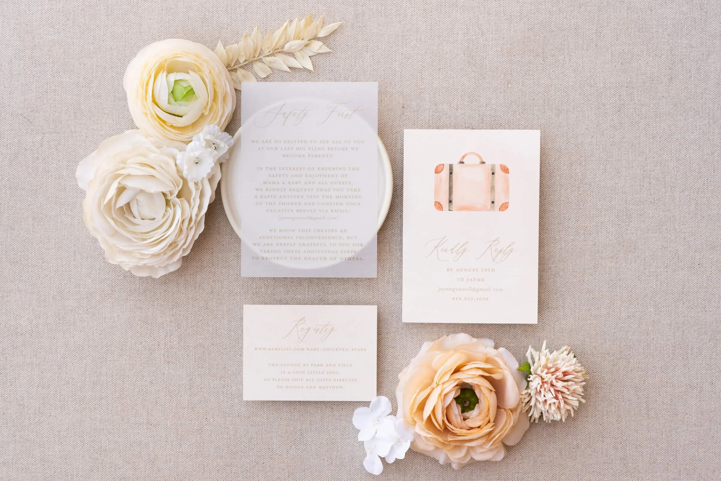 Baby shower details cards featuring coordinating peach and sage watercolor artwork with information about the celebration, travel-inspired design elements, and modern typography.