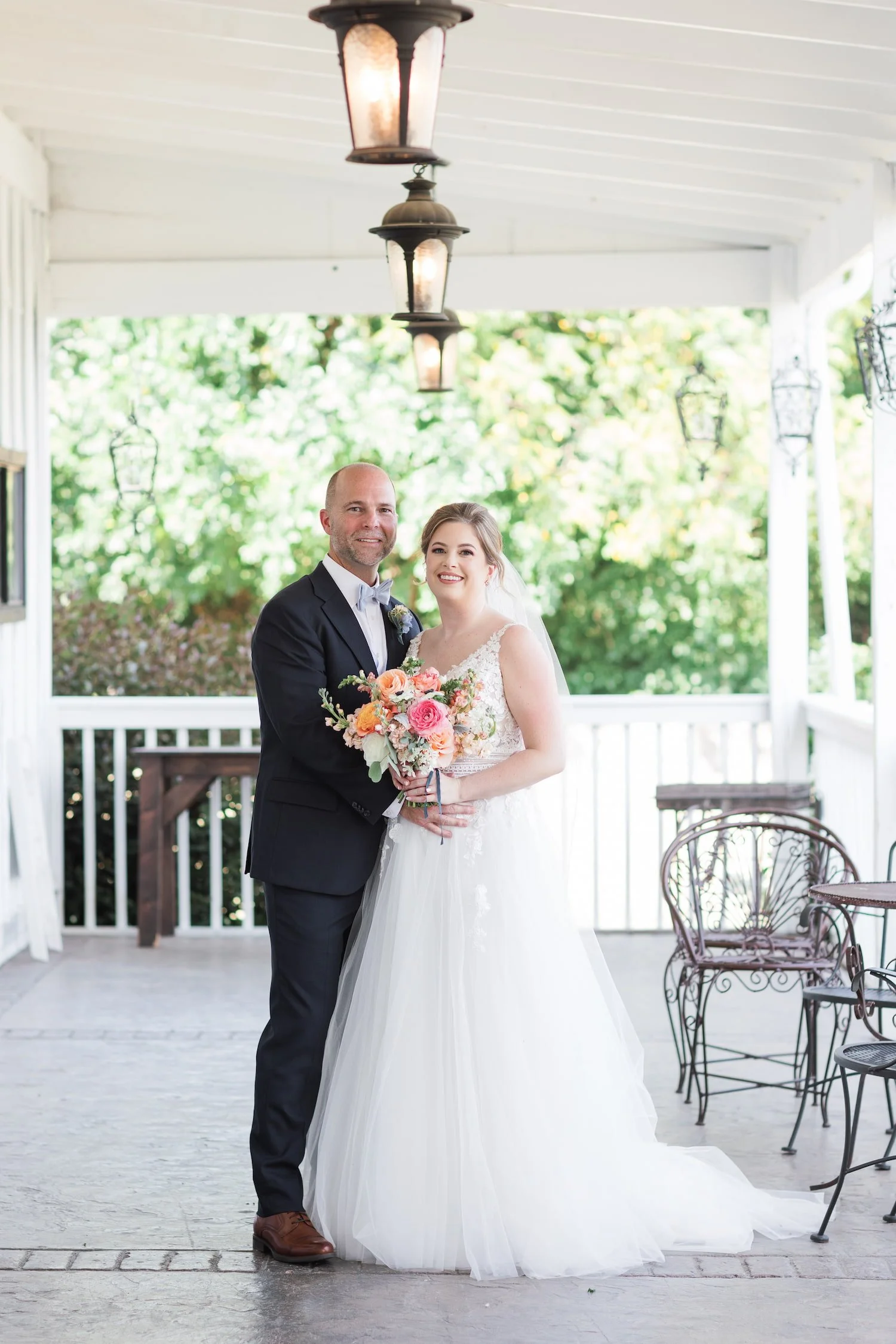 Luxury wedding stationery collection for a Bluemont Vineyard celebration featuring letterpress printing, blind deboss details, edge-painted cards, custom oval wax seals, and a bespoke floral crest.
