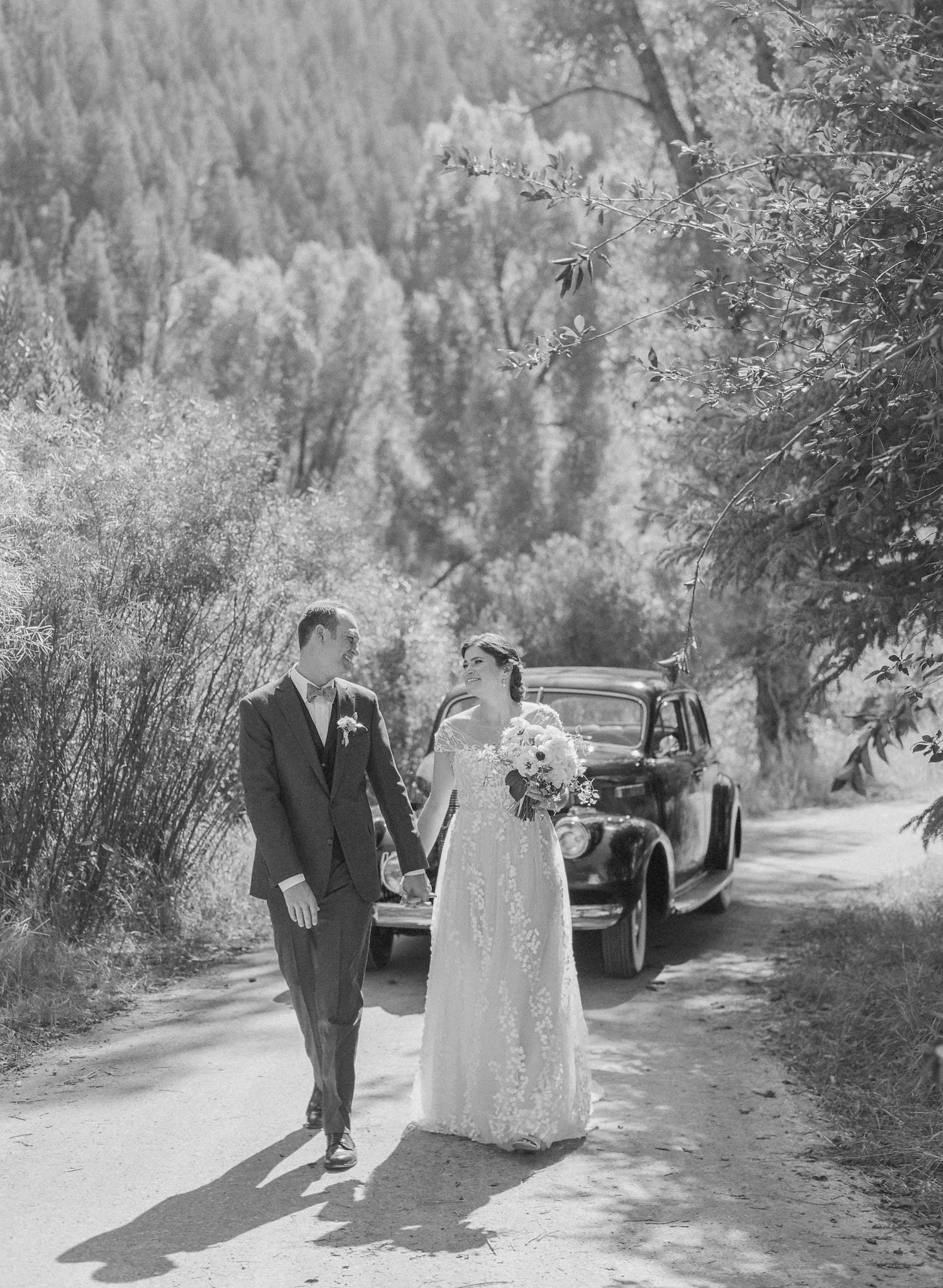 Bride and groom outside private family residence in Steamboat Springs, Colorado on their wedding day in September.