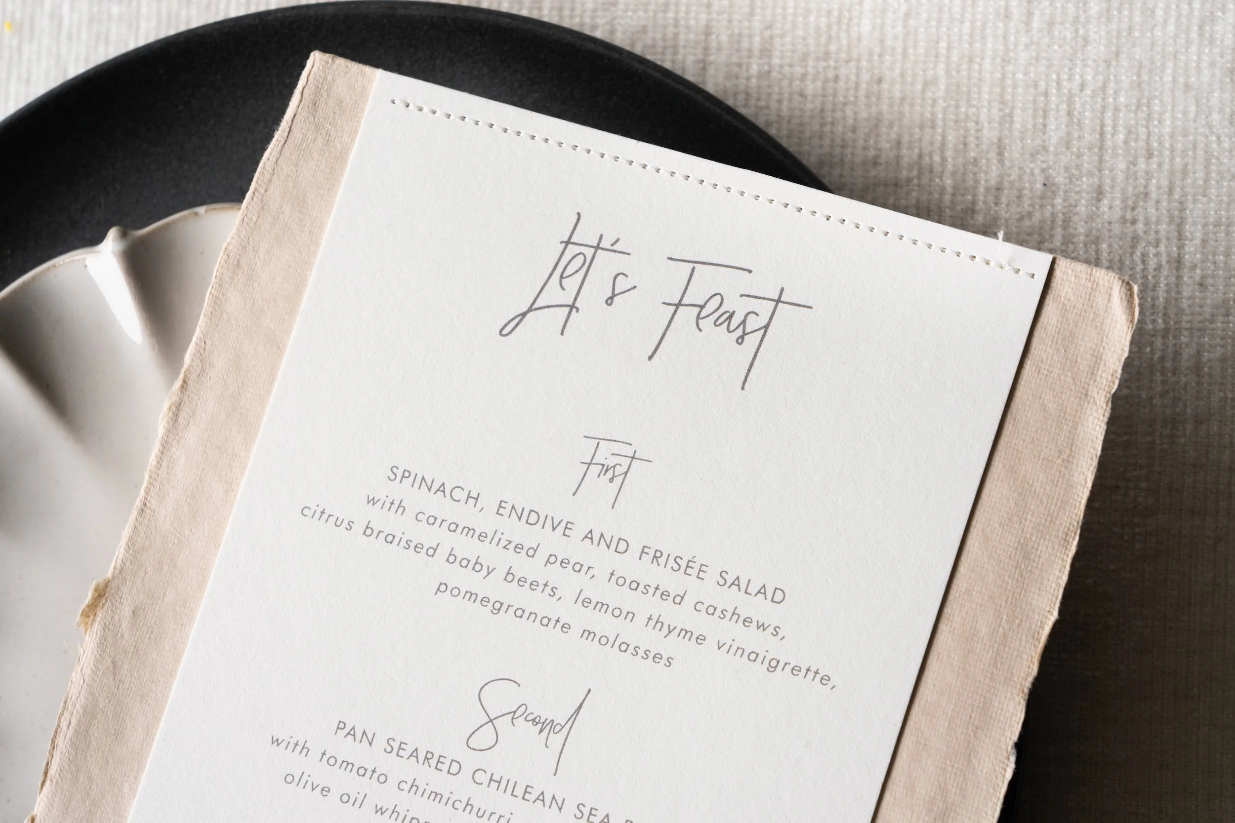Luxury handmade paper wedding suite and wedding day items including menu with letterpress printing and sophisticated desert textures designed for an upscale Scottsdale wedding celebration.