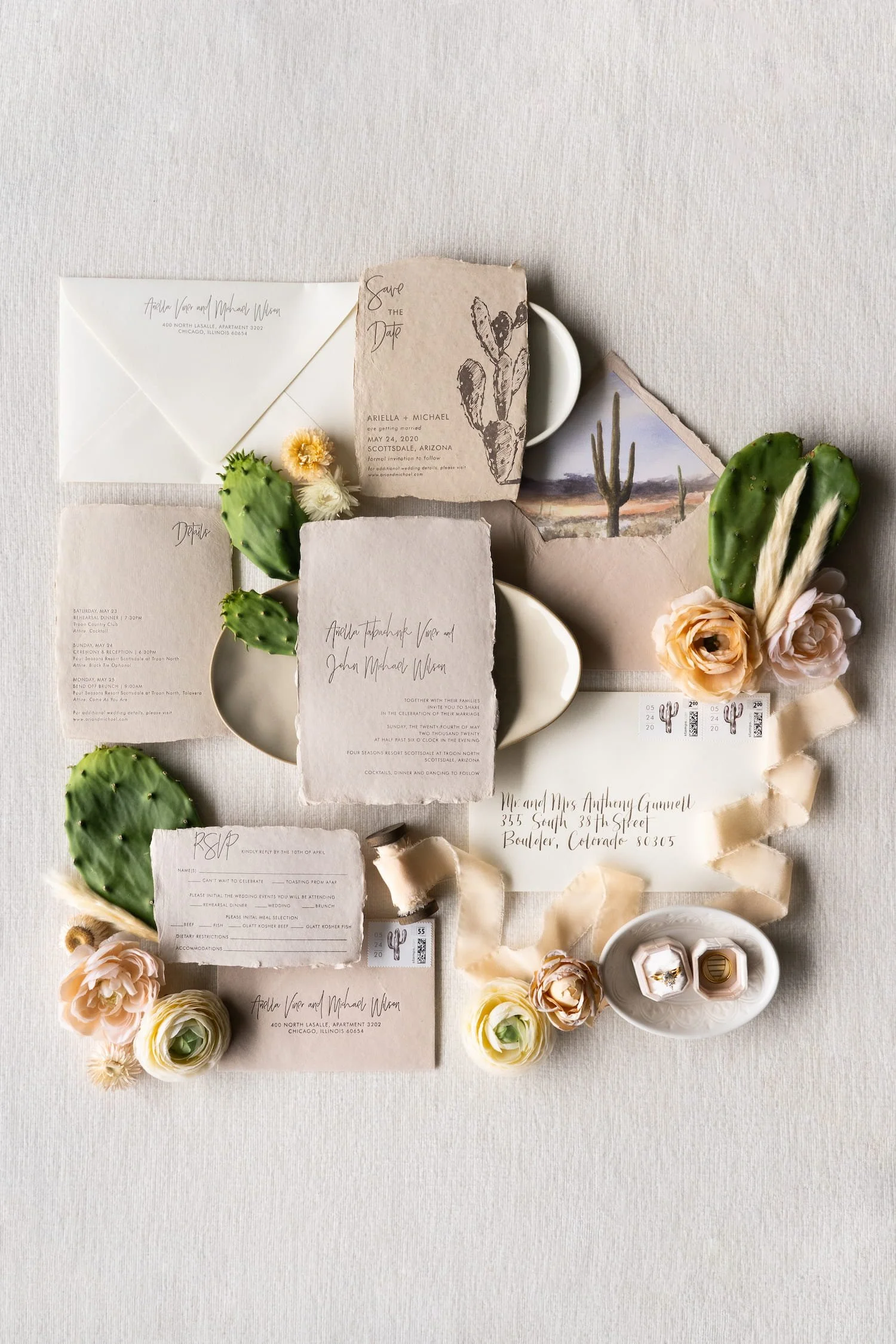 Luxury handmade paper wedding suite with letterpress printing and sophisticated desert textures designed for an upscale Scottsdale wedding celebration.